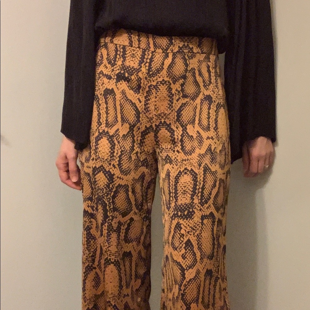 Like new ZARA snake skin print high waisted wide leg trousers. Size M.
